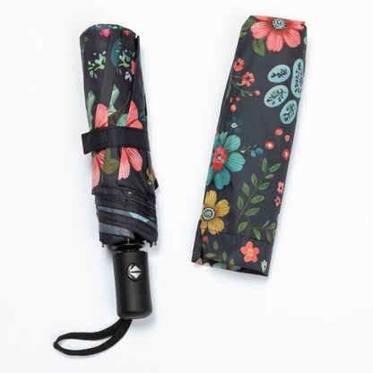 Foldable umbrella with floral pattern on a white background