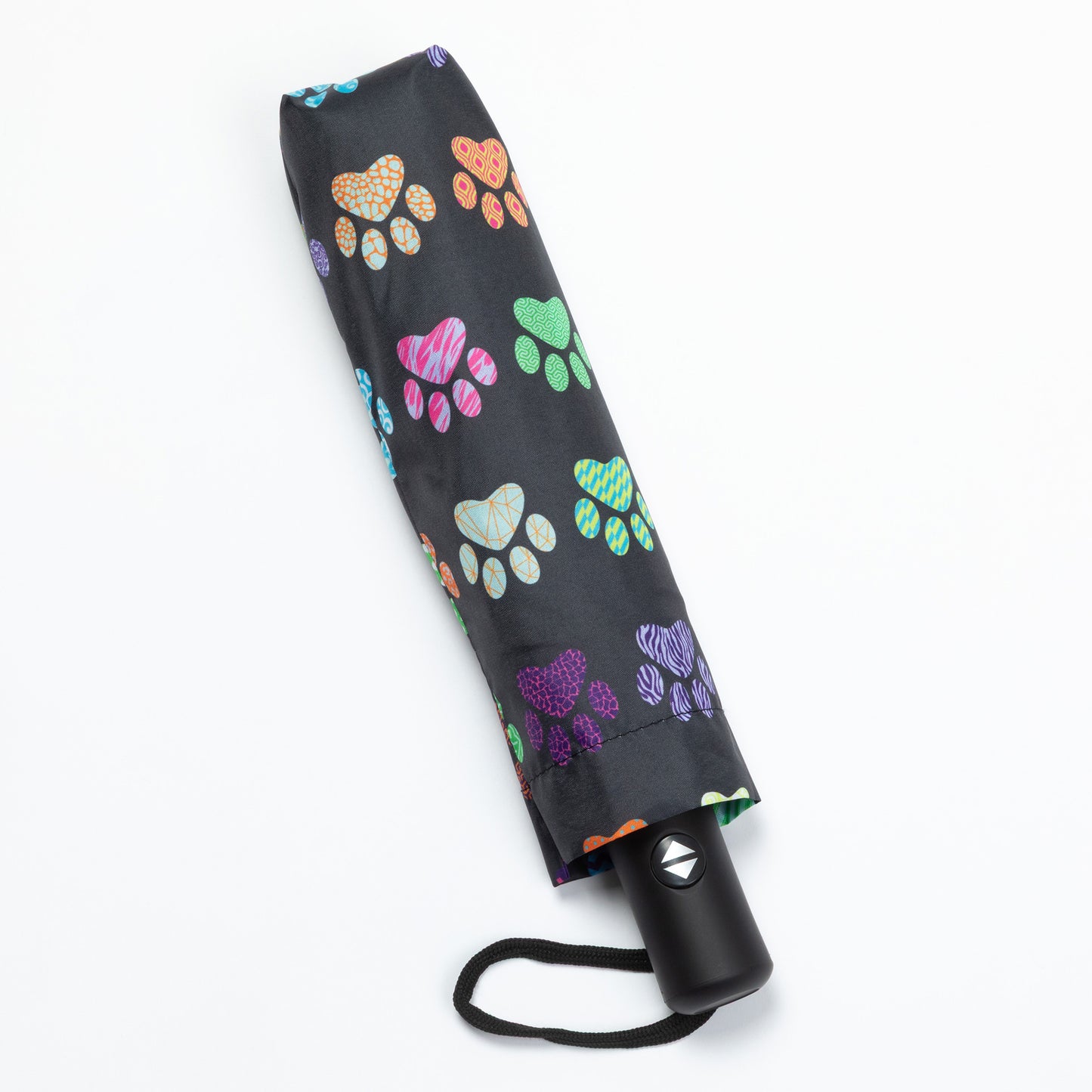 Black umbrella with colorful paw print pattern on a white background