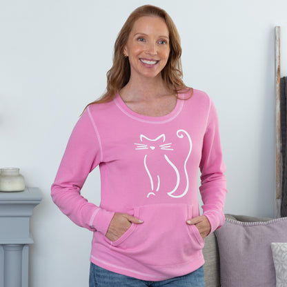 Woman wearing a pink long sleeve thermal top with white contrast stitching, and a cat silhouette on the front.