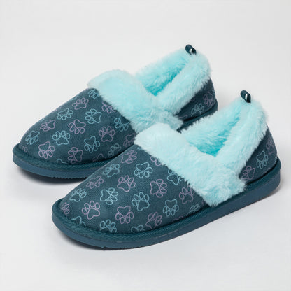 A pair of slip-on slippers with a dark teal-blue fabric upper covered in a light blue and purple paw print pattern, featuring fluffy light blue faux-fur trim around the opening and sole.