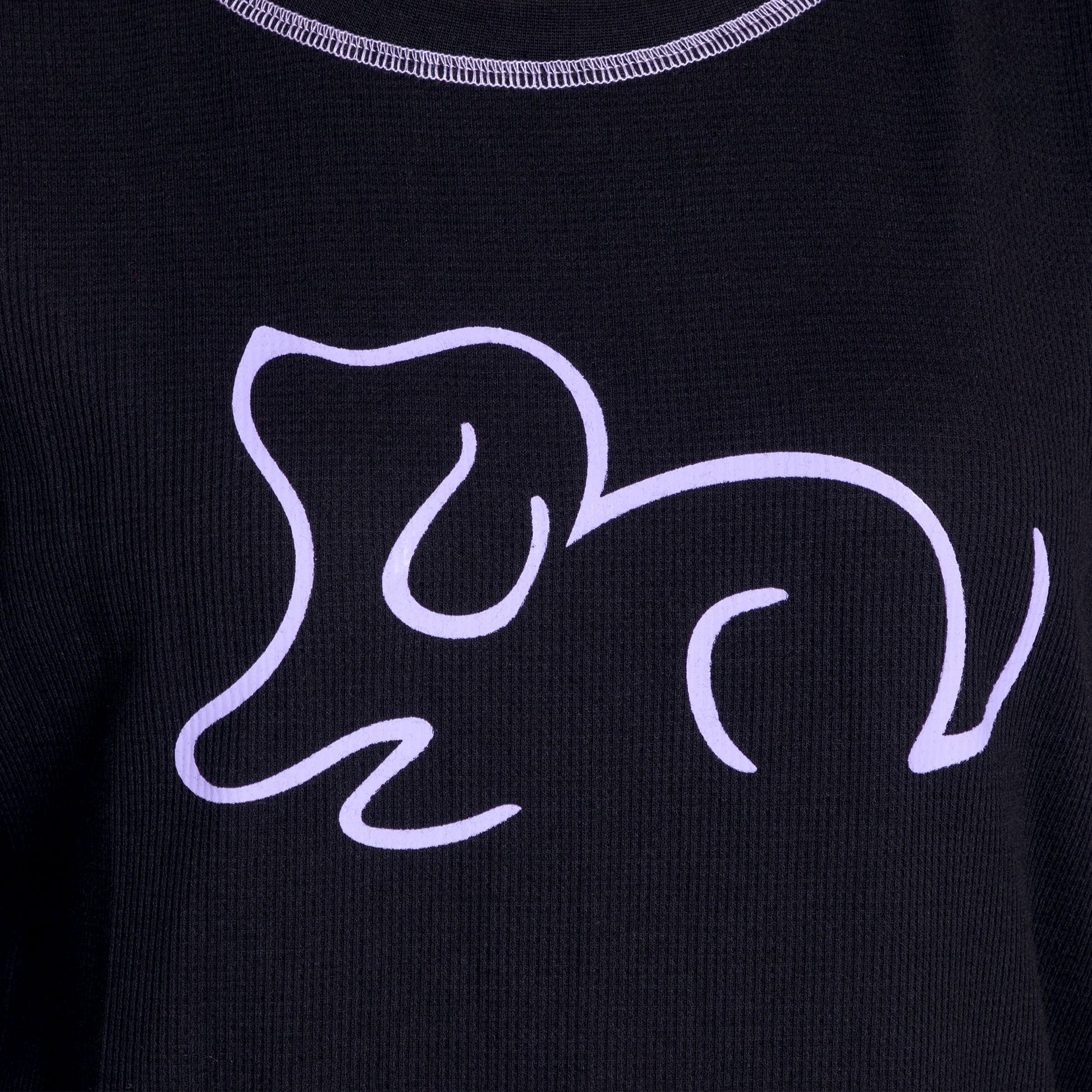 Black fabric featuring a minimalist purple line drawing of a playful dog.