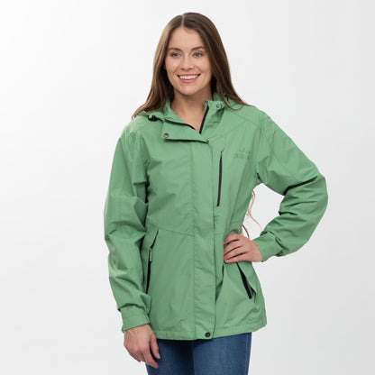 Woman wearing a green raincoat on a white background