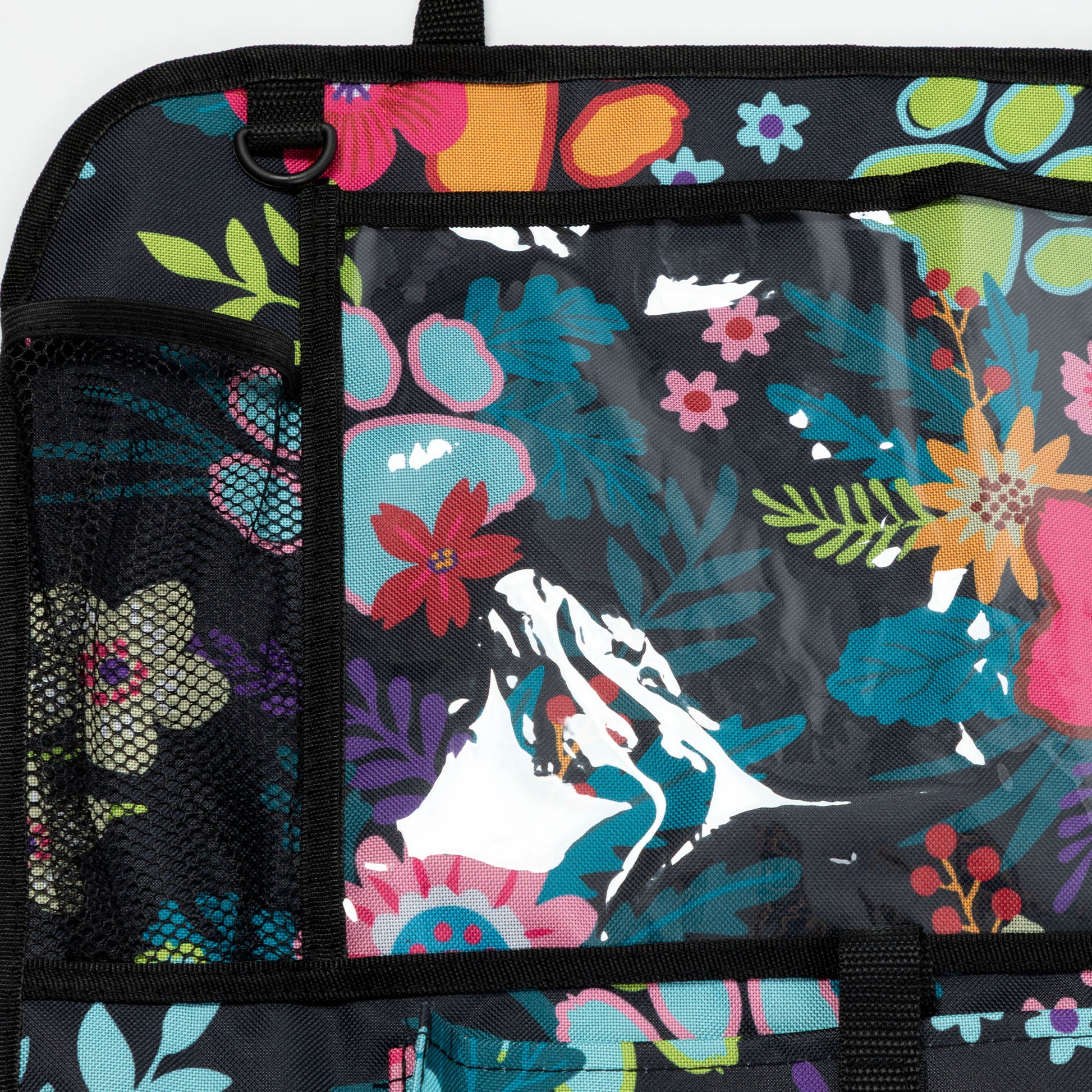 Backpack with colorful floral and mountain design on a black background