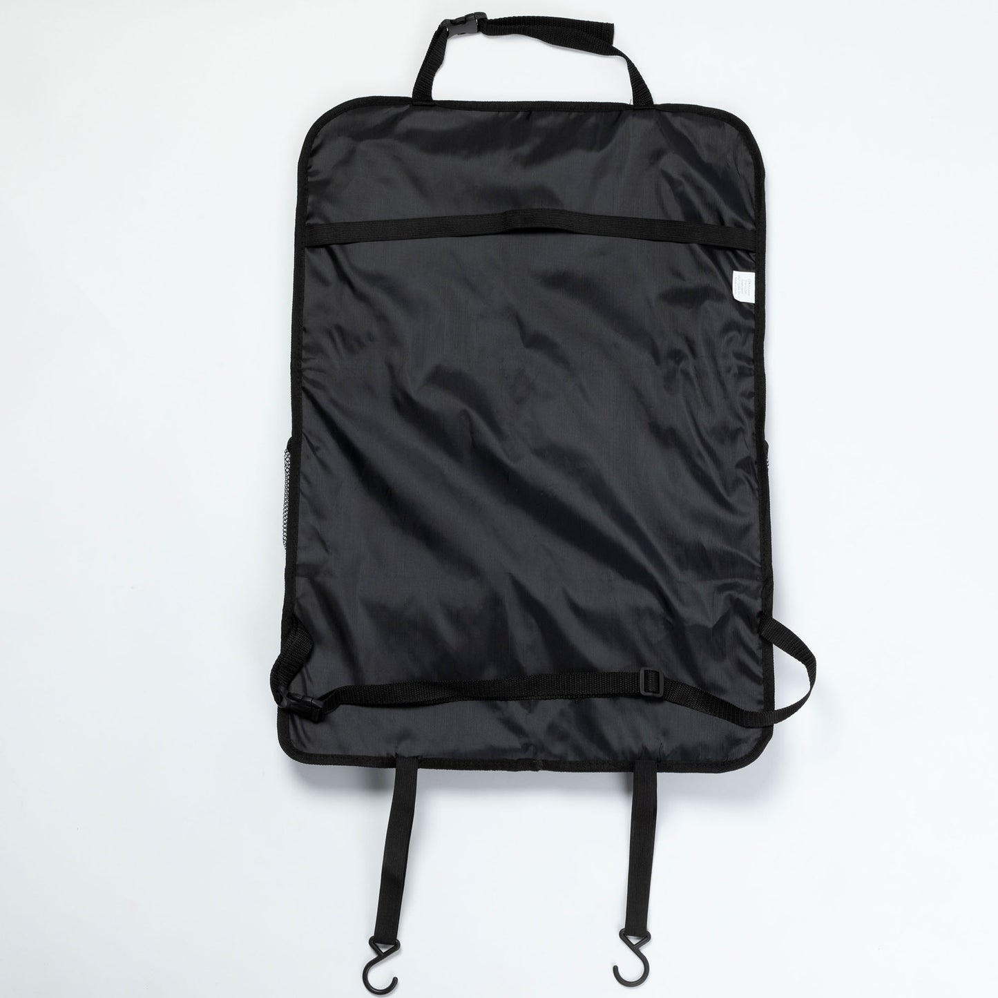 Black car organizer bag with straps on a white background