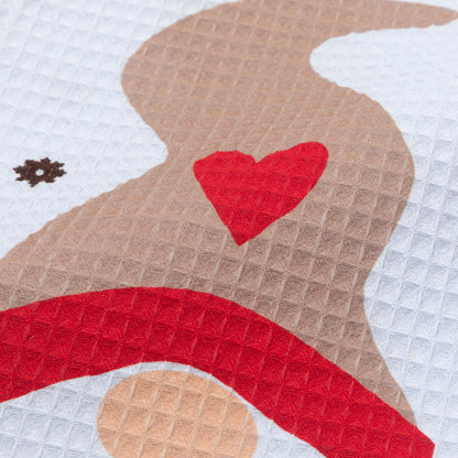 Close-up of gnome towel design featuring a red heart.