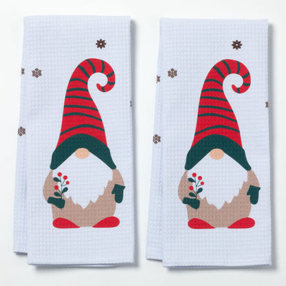 Two kitchen towels with Christmas gnome design on a white background