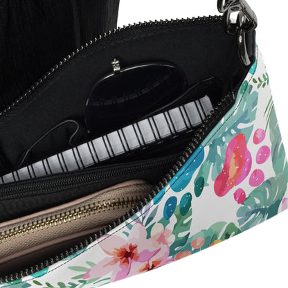 Floral-patterned handbag with a zipper, showing the interior.
