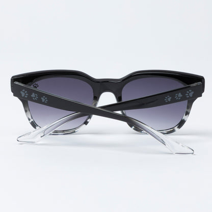 Black cat-eye sunglasses with paw print details on a white background