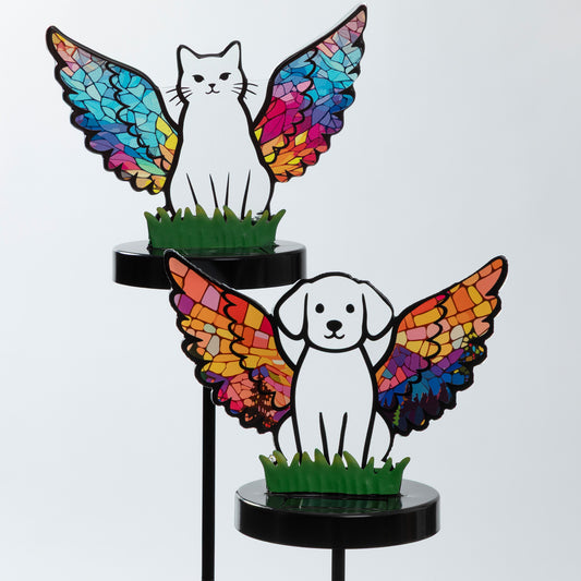 Cat and dog solar garden stake with each pet wearing mosaic rainbow color wings.