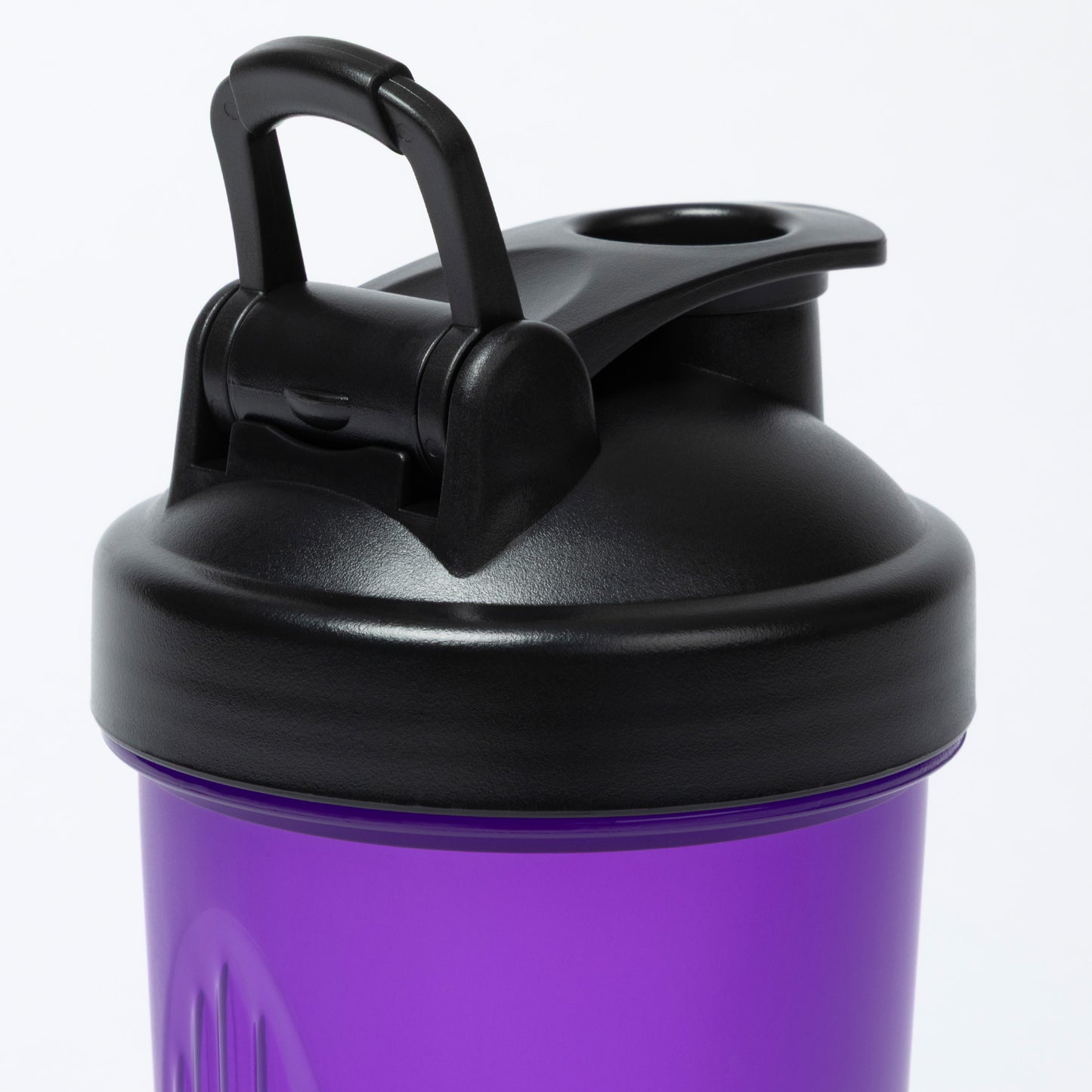 Purple shaker bottle with black lid on a white background