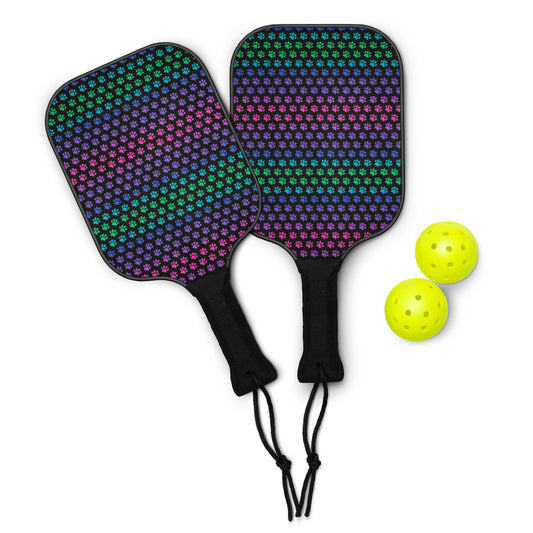 Two colorful pickleball paddles with two yellow pickleballs on a white background