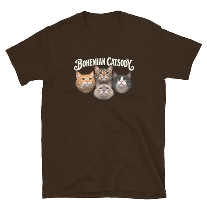 A dark brown short-sleeve crewneck t-shirt featuring a graphic print of four different cat faces with the text 'BOHEMIAN CATSODY' above them, displayed on a clean white background.
