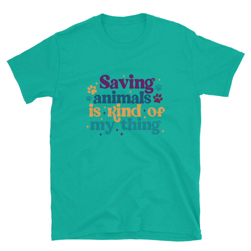 jade green shirt that reads Saving Animals is kind of my Thing with several paw print and sparkle images in a purple, yellow and blue font.