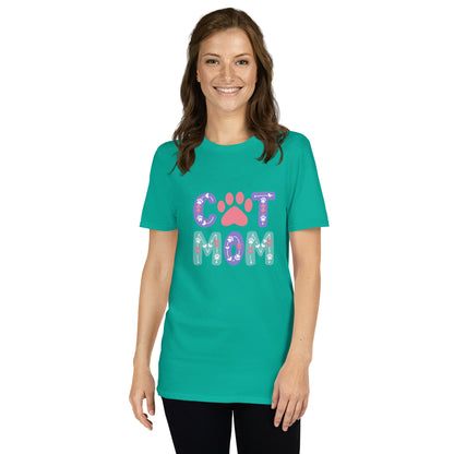Woman wearing a teal t-shirt with 'Cat Mom' print on a white background