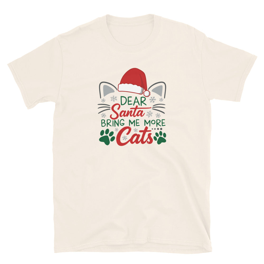 Off White Short Sleeve Shirt that reads Dear Santa Bring Me More Cats. Featuring a santa hat, cat ears and cat whiskers with paw prints