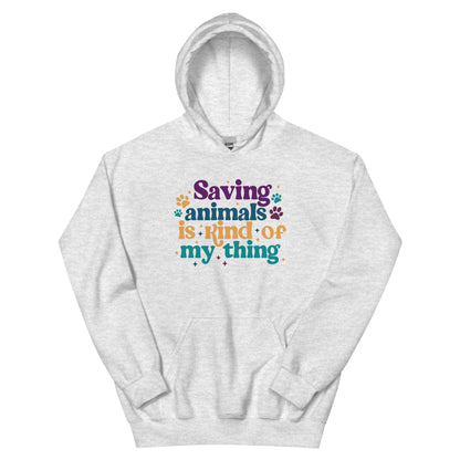 Sports gray Hooded Sweatshirt that reads Saving Animals is kind of my Thing with several paw print and sparkle images in a purple, yellow and blue font.