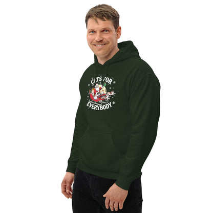 Man wearing a dark green Hoodie that says Cats for Everybody with an image of Santa in a Sleigh throwing out presents and catsct mockup