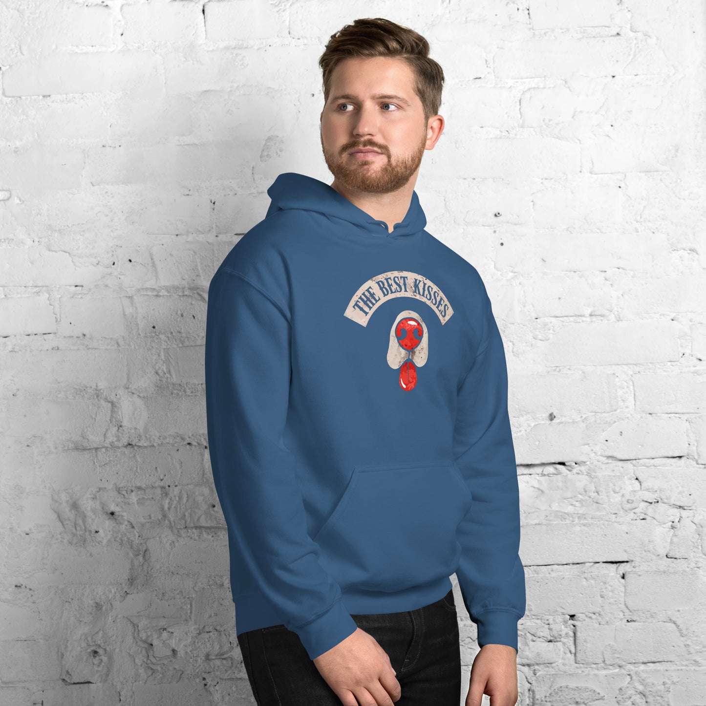 Blue hoodie with a dog nose and tongue sticking out design that reads "the best kisses"  - on a male model