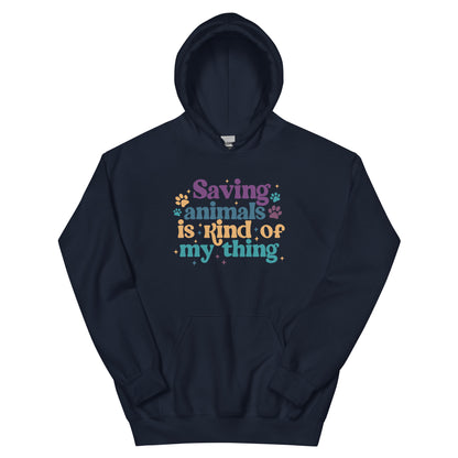 Navy Hooded Sweatshirt that reads Saving Animals is kind of my Thing with several paw print and sparkle images in a purple, yellow and blue font.