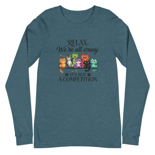 A heathered blue long-sleeve t-shirt with a graphic of colorful cats and the text 'RELAX, We're all crazy IT'S NOT A COMPETITION' on the front, displayed on a solid white background.