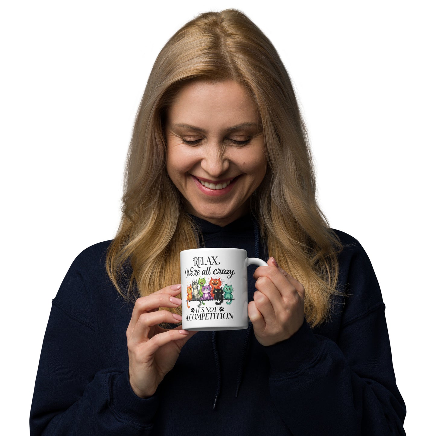 Woman holding a mug with a cartoon cats on a white background