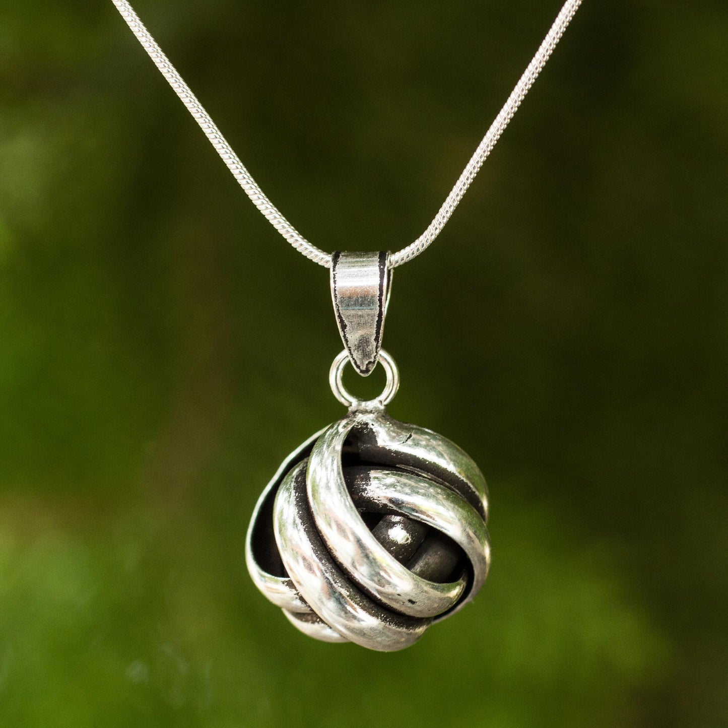 Double Love Knot Artisan Crafted Silver Pendant Necklace