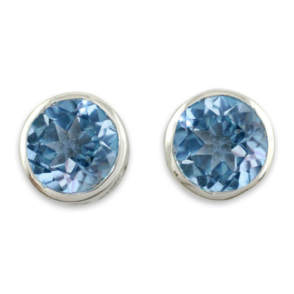 Spark of Life Blue Topaz Silver Wave Earrings