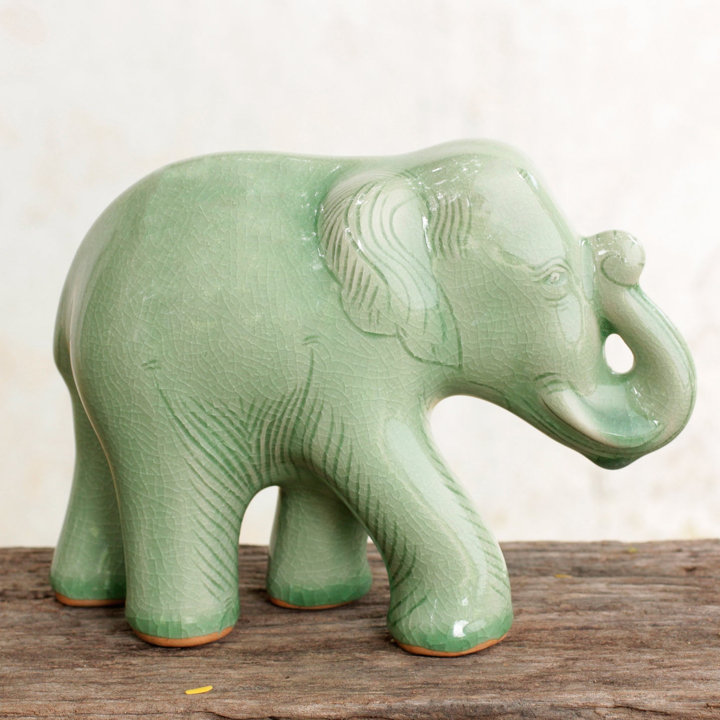 Smiling Elephant Celadon Ceramic Happy Elephant Figurine by Thai Artisans