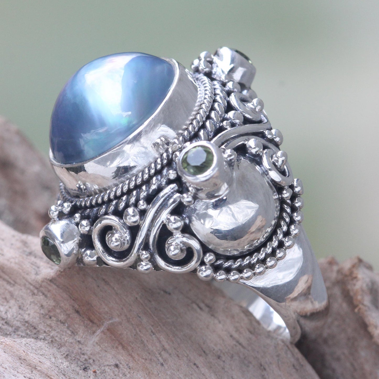 Regal Blue Glory Artisan Crafted Blue Mabe Pearl and Peridot Cocktail Ring