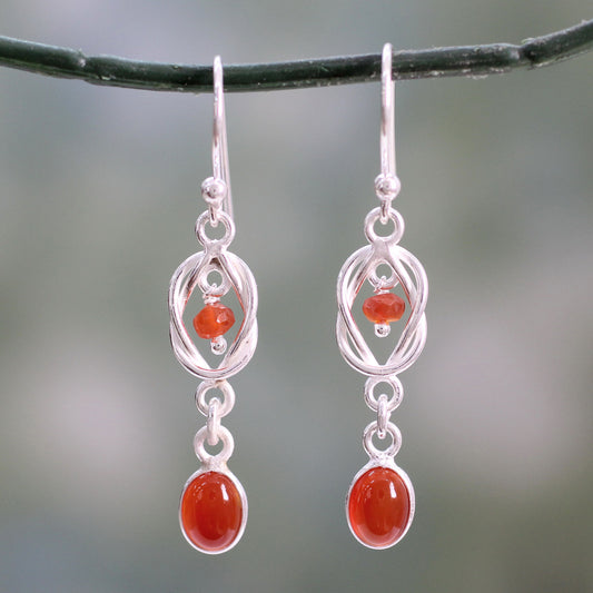 Festive Knot Artisan Crafted Sterling Silver and Red Onyx Dangle Earrings