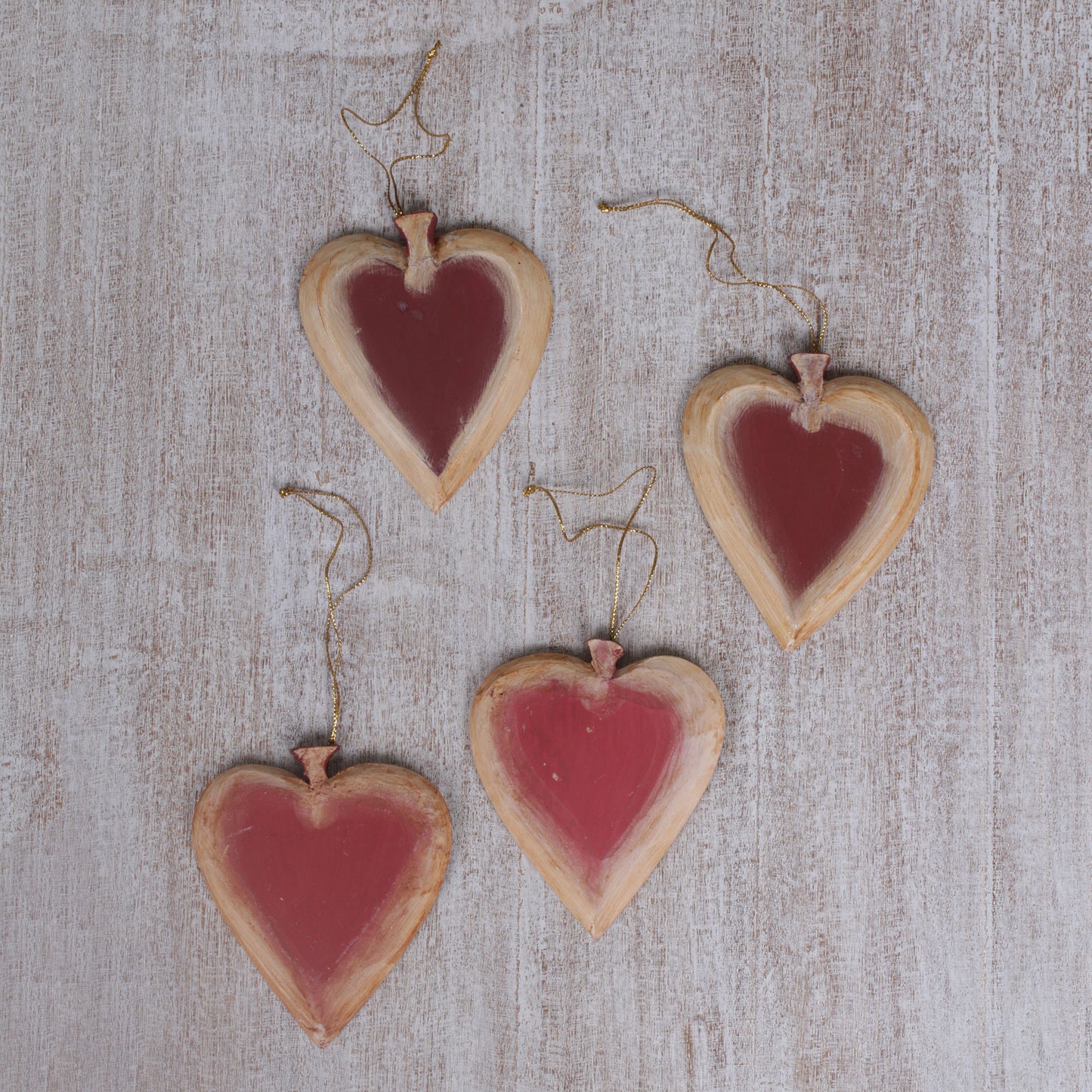 Ruby Hearts Set of Four Painted Wood Heart Ornaments from Bali