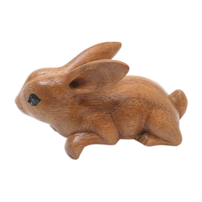 Curious Rabbit in Brown Handcrafted Suar Wood Rabbit Sculpture in Brown from Bali