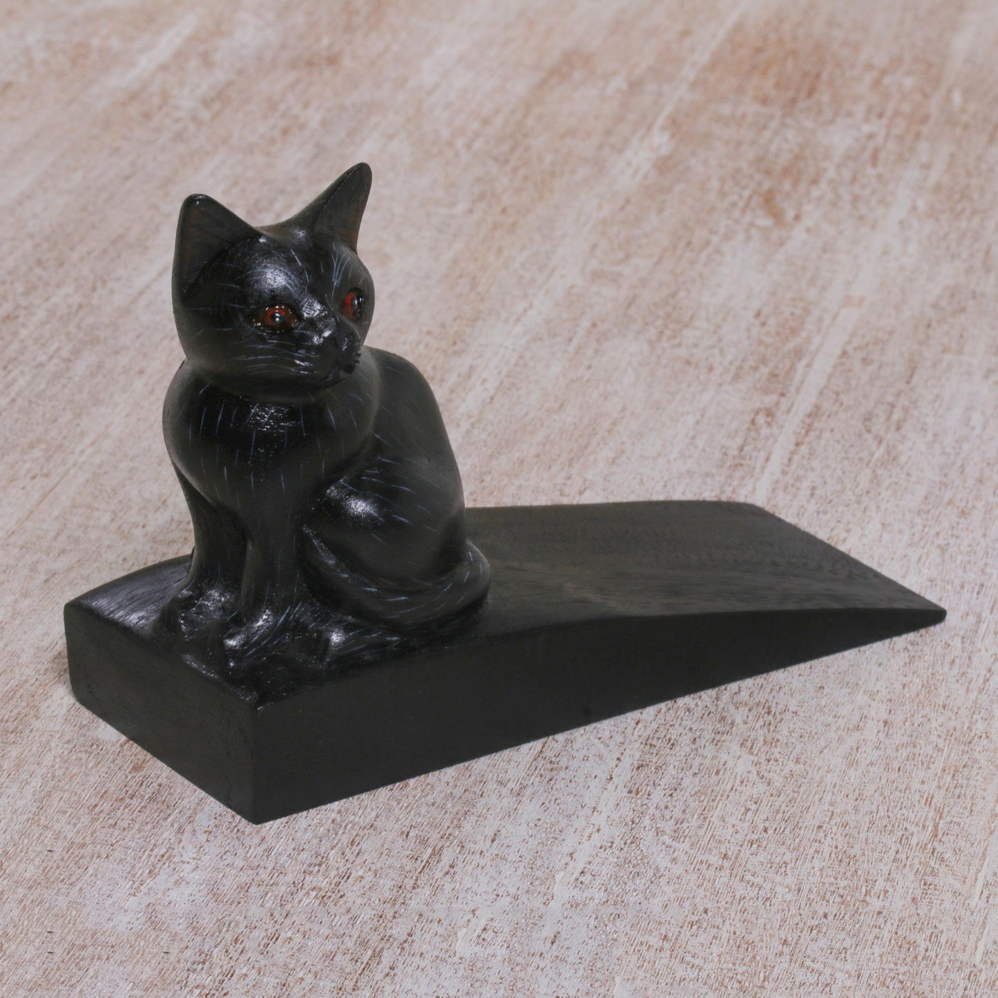 Helpful Kitten In Black Wood Doorstop