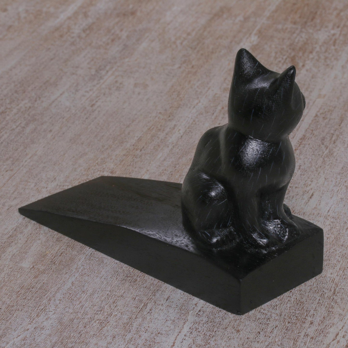 Helpful Kitten In Black Wood Doorstop