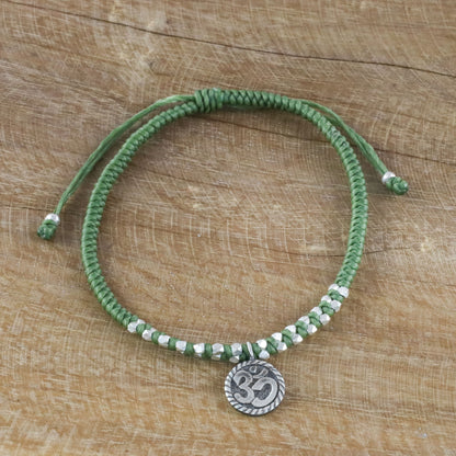 Ancient Om in Green Silver Om Charm Bracelet on Braided Green Cords