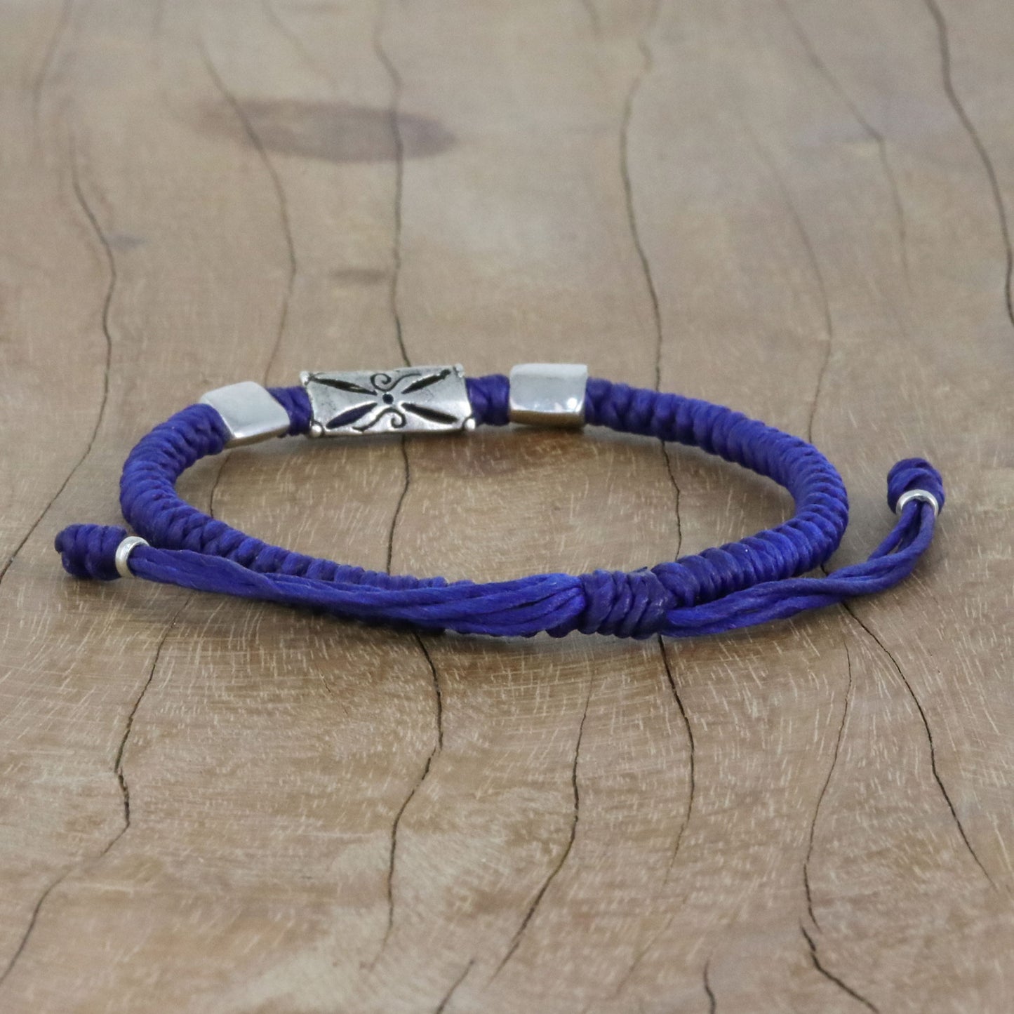 Karen Triangle in Blue Hill Tribe Blue Cord Bracelet with Silver Beads