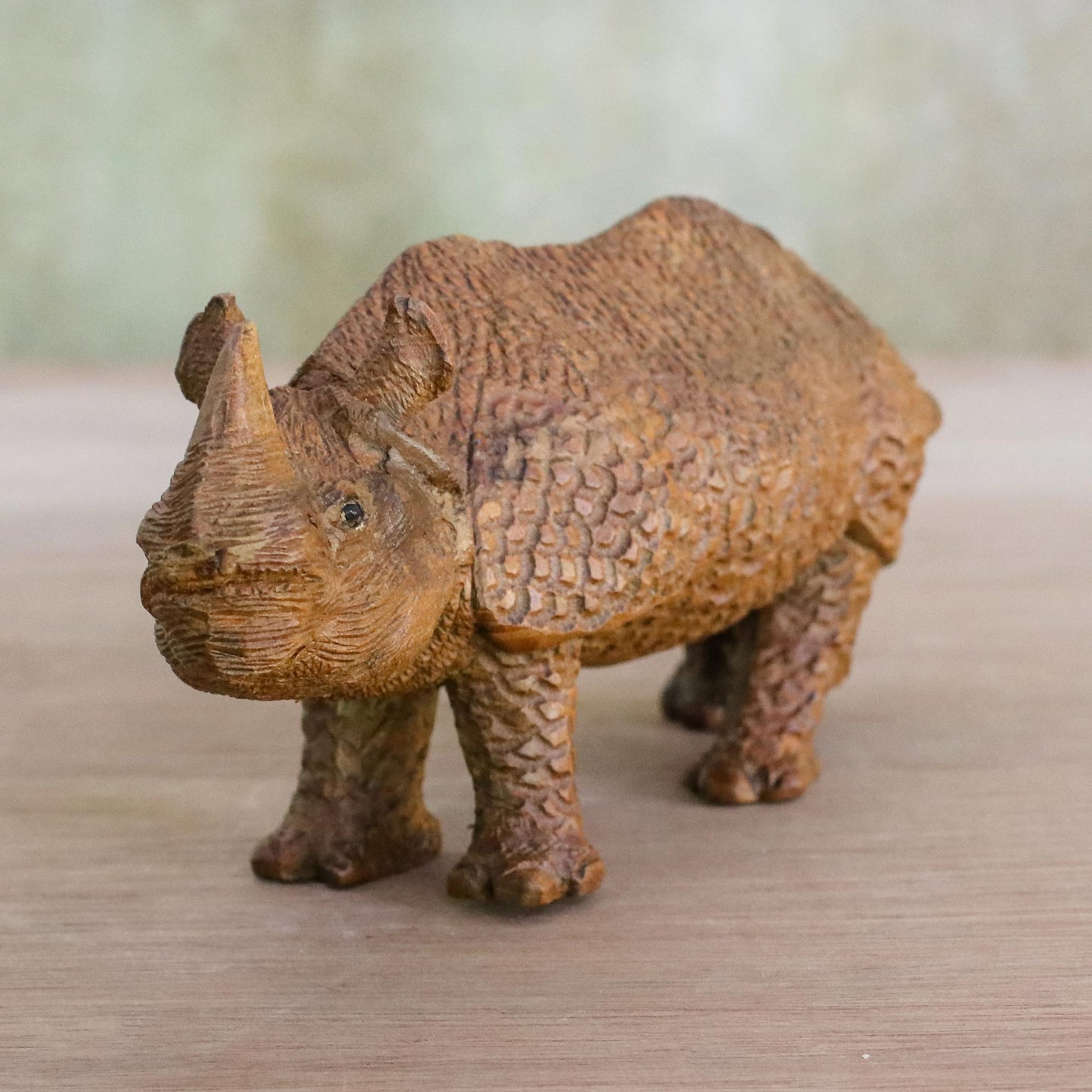 Curious Rhino Hand-Carved Raintree Wood Rhinoceros Sculpture