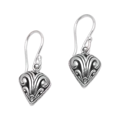 Swirling Crest Sterling Silver Swirl Motif Dangle Earrings from Bali