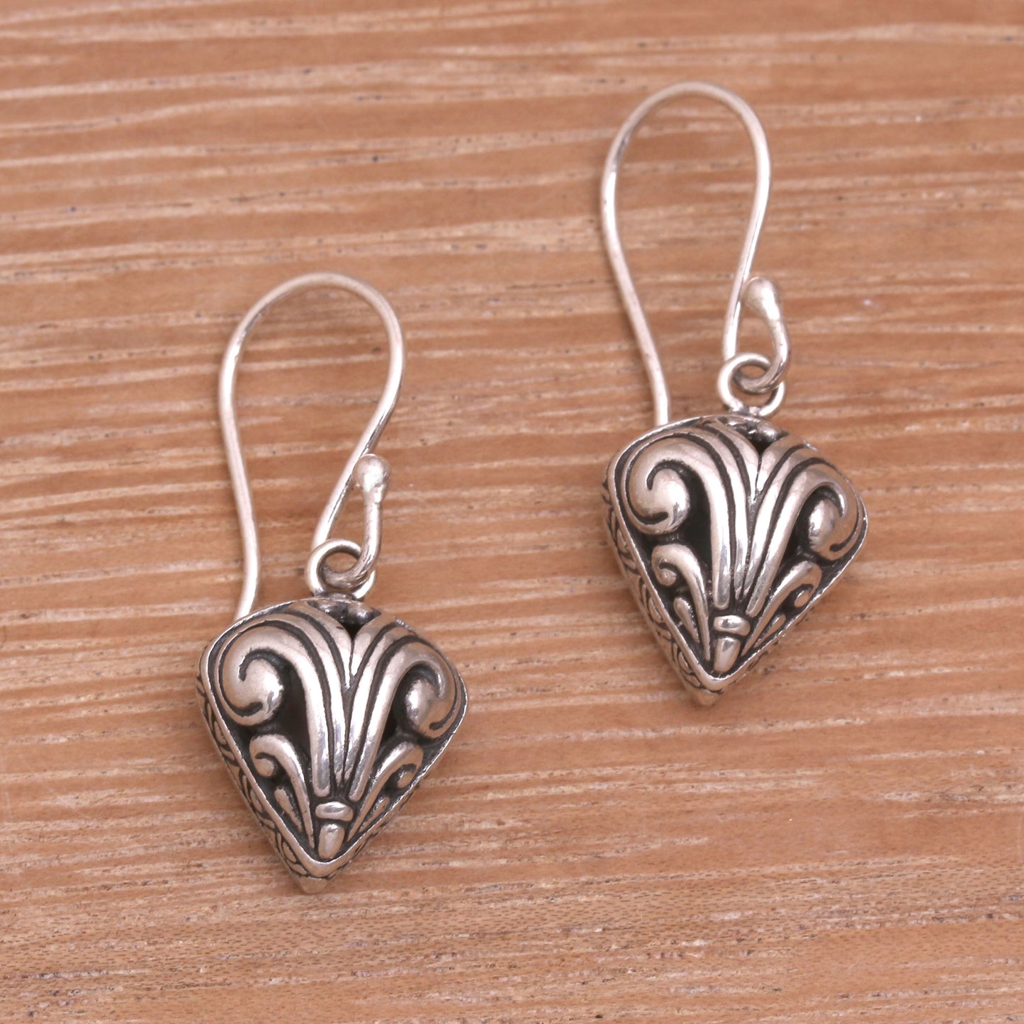 Swirling Crest Sterling Silver Swirl Motif Dangle Earrings from Bali