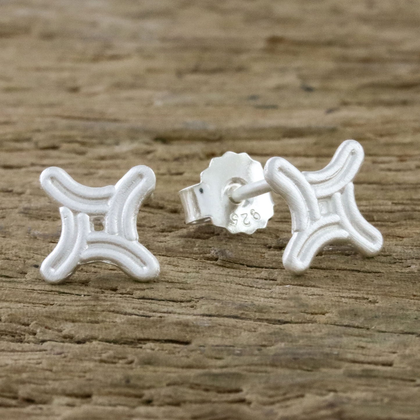 Winking Star Curved Four-Sided Star Sterling Silver Stud Earrings