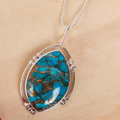 Wintry Eye Composite Turquoise and Taxco Silver Pendant Necklace