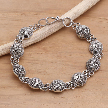 Buttons Sterling silver link bracelet